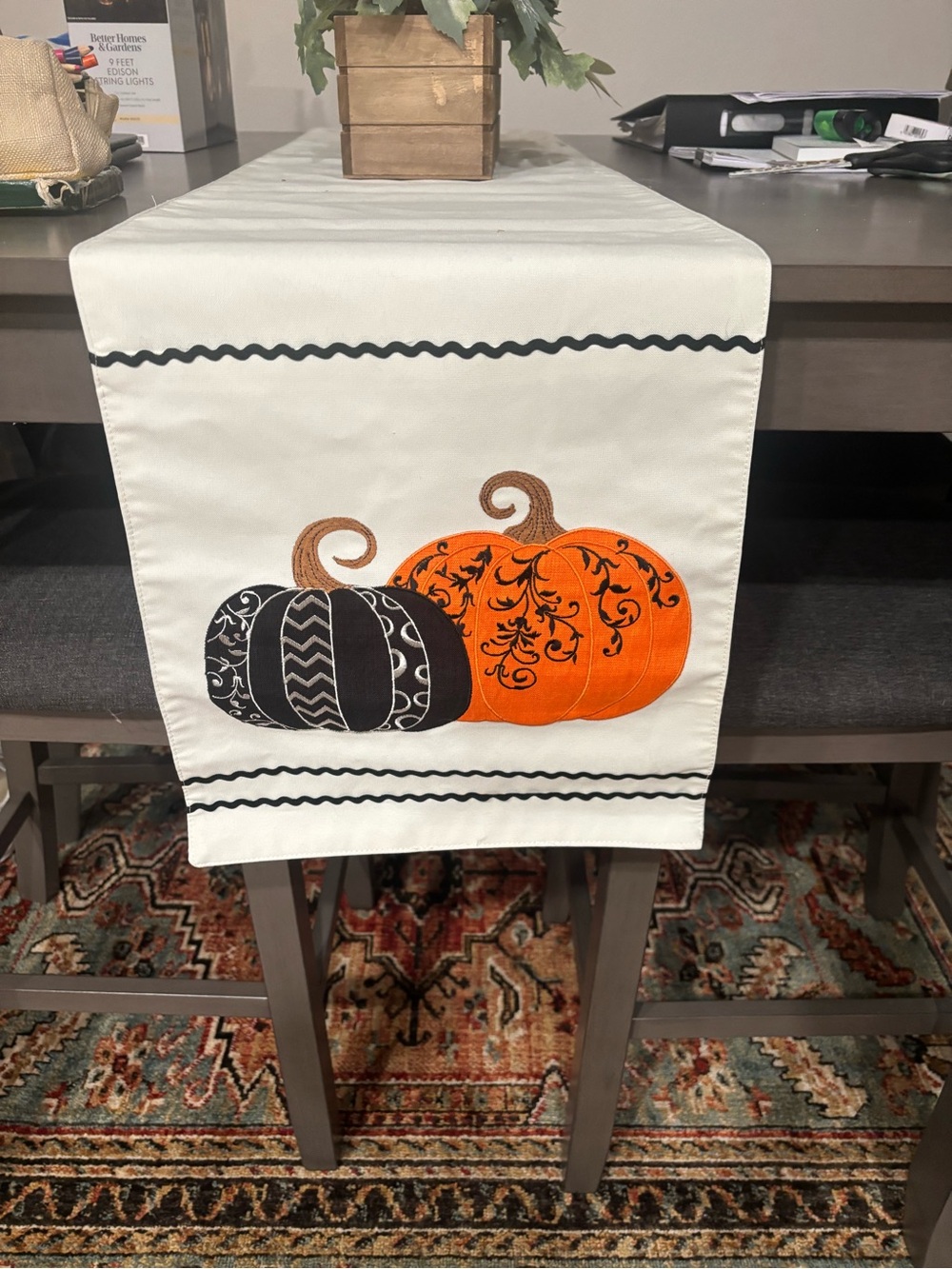Witchery Cream Table Runner with Orange and Black Pumpkin Motif
